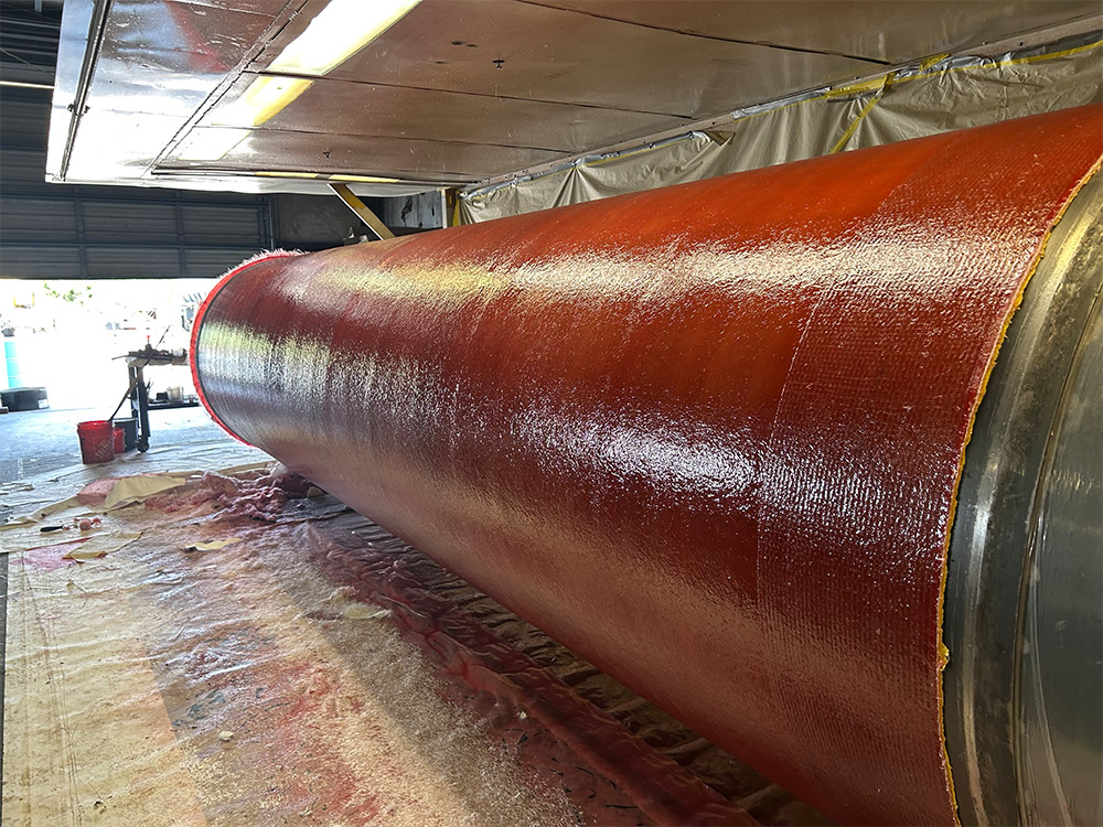 Barrel-only tank from Poly-Coat Systems during fiberglass composite application.