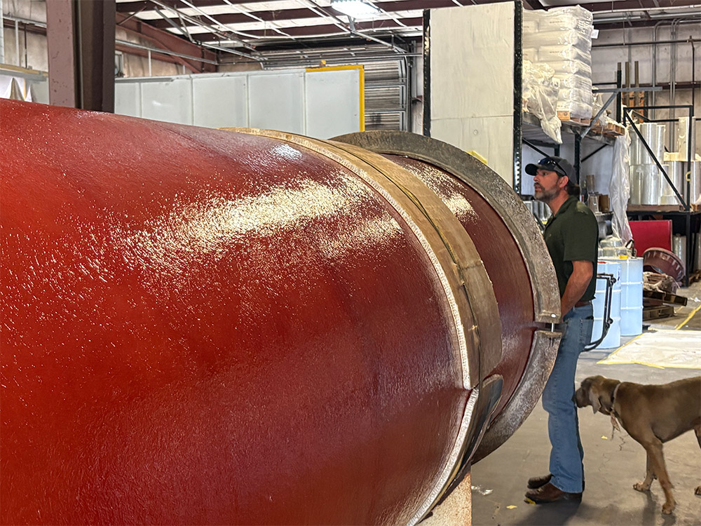 Fiberglass barrel-only tank from Poly-Coat Systems in the fabrication shop during composite construction.