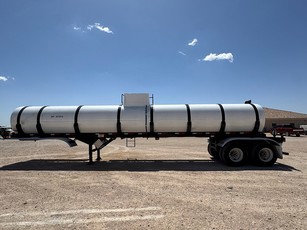 Side profile of a completed stock tank trailer from Poly-Coat Systems.